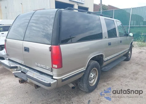 1999 Chevrolet Suburban C2500 из США, поврежденный, VIN 3GNGC26F0XG206137